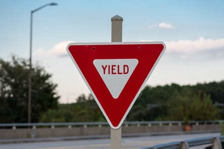 Yield Sign on Bridge stock photo